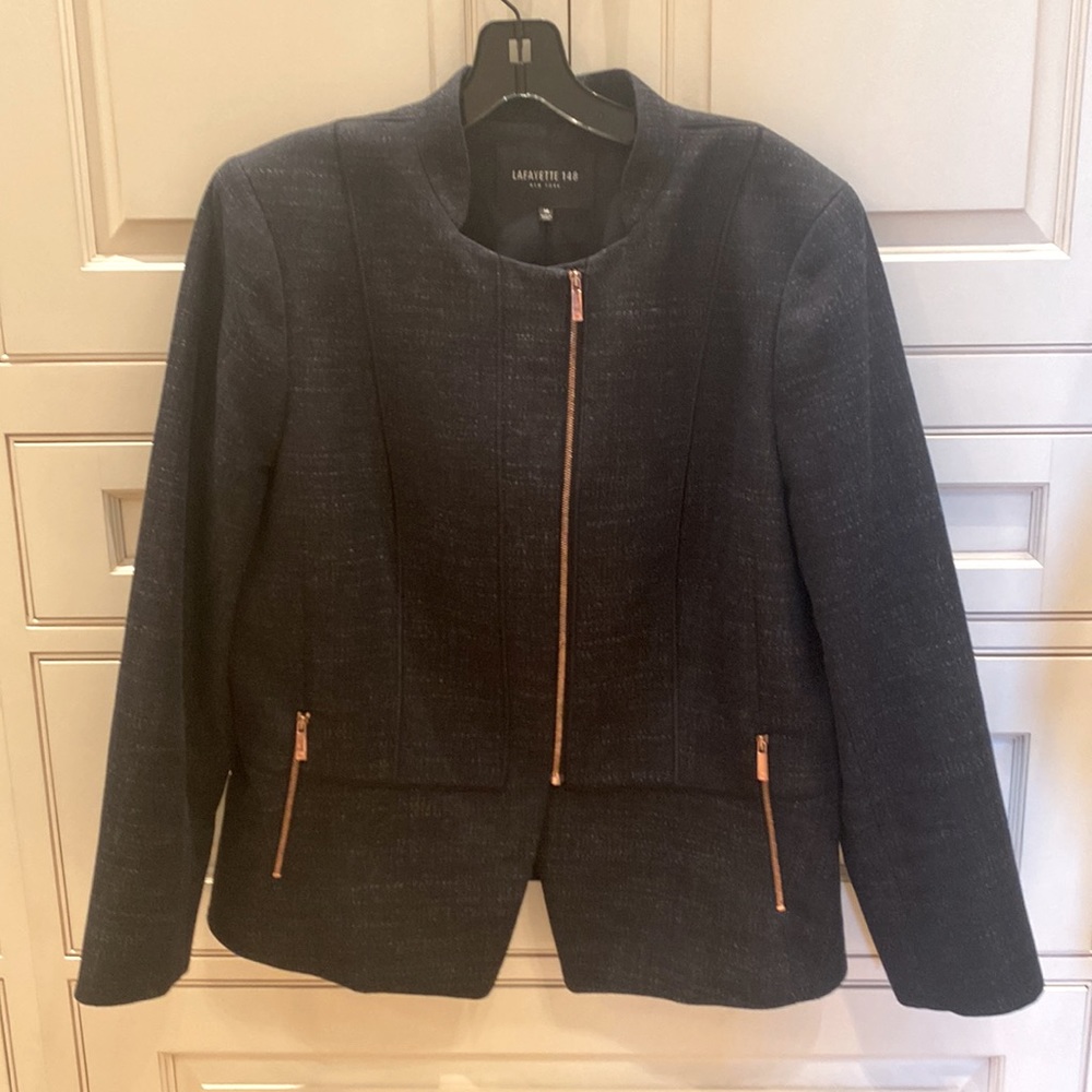 Navy Peplum jacket with rose gold zipper and topstitching details.  Size 14